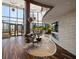 Grand lobby area with high ceilings, wood floors, stone accent wall, and comfortable seating at 3344 Peachtree Ne Rd # 3005, Atlanta, GA 30326