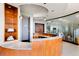 Welcoming lobby area with a concierge desk, accent lighting, and a mirrored accent wall at 3344 Peachtree Ne Rd # 3005, Atlanta, GA 30326