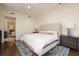 Bright main bedroom featuring a plush bed, stylish furnishings, and elegant decor at 3344 Peachtree Ne Rd # 3005, Atlanta, GA 30326
