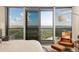 Bright main bedroom with large windows offering stunning views and comfortable seating area at 3344 Peachtree Ne Rd # 3005, Atlanta, GA 30326