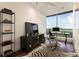 Bright office with expansive windows and a desk with city views at 3344 Peachtree Ne Rd # 3005, Atlanta, GA 30326