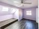 Charming bedroom with wood-look flooring and lots of natural light at 5479 Dorsett Shoals Rd, Douglasville, GA 30135