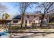 Backyard exterior view with multi-level wooden deck and the house facade in the background at 5479 Dorsett Shoals Rd, Douglasville, GA 30135