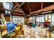 Spacious garage interior, featuring exposed beams, and ample space for storage or projects at 5479 Dorsett Shoals Rd, Douglasville, GA 30135