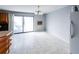 Bright eat-in kitchen featuring tile floors, lots of space, and a refrigerator at 5479 Dorsett Shoals Rd, Douglasville, GA 30135
