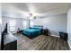 Spacious main bedroom with lots of natural light, featuring wood floors and ample closet space at 5479 Dorsett Shoals Rd, Douglasville, GA 30135