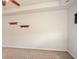 Bedroom featuring a carpeted floor, wooden wall shelves, and a ceiling fan at 692 Oakside Pl, Acworth, GA 30102
