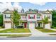 Charming townhomes with manicured lawns, stone accents, and individual driveways, located in a Gathering-friendly neighborhood at 692 Oakside Pl, Acworth, GA 30102