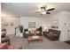 Comfortable living room showcasing neutral walls, plush sofas, and an open layout at 692 Oakside Pl, Acworth, GA 30102