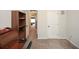 Functional office space with built-in shelving and a view into a bedroom at 692 Oakside Pl, Acworth, GA 30102