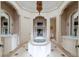 Luxurious bathroom with freestanding tub, fireplace, mosaic tile, and dual vanities at 1040 W Conway Nw Dr, Atlanta, GA 30327