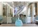Elegant dining room with mirrored walls, ornate chandelier, and stylish seating at 1040 W Conway Nw Dr, Atlanta, GA 30327