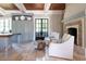 Well-appointed kitchen open to a cozy fireplace and custom cabinets at 1040 W Conway Nw Dr, Atlanta, GA 30327