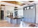 Spacious kitchen featuring a large island, custom cabinets, and tile floors at 1040 W Conway Nw Dr, Atlanta, GA 30327