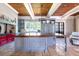 Large kitchen with custom island, high-end appliances and abundant natural light at 1040 W Conway Nw Dr, Atlanta, GA 30327