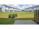Large grassy backyard area with mature landscaping and privacy fence for outdoor enjoyment at 1312 Cooper Springs Rd, Grayson, GA 30017