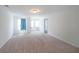 Spacious bedroom with carpet flooring and abundant natural light from multiple windows at 1312 Cooper Springs Rd, Grayson, GA 30017