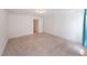 Spacious bedroom with neutral carpet and ample natural light entering through the doorway at 1312 Cooper Springs Rd, Grayson, GA 30017