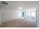 Large, bright bedroom with neutral carpet and two well-lit window areas at 1312 Cooper Springs Rd, Grayson, GA 30017