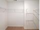 Walk-in closet featuring adjustable shelving for optimal storage solutions at 1312 Cooper Springs Rd, Grayson, GA 30017