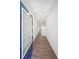 Inviting hallway with hardwood floors and recessed lighting that leads to the main living areas at 1312 Cooper Springs Rd, Grayson, GA 30017