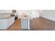 Modern kitchen with granite countertops, stainless-steel appliances, and center island at 1312 Cooper Springs Rd, Grayson, GA 30017