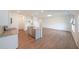 Open-concept kitchen with granite countertops and stainless-steel appliances at 1312 Cooper Springs Rd, Grayson, GA 30017