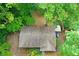 Birds eye view of house surrounded by lush green trees and greenery at 3517 Greenway Dr, Marietta, GA 30008