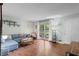 Bright living room with hardwood floors, large windows, and comfortable seating area, perfect for relaxation at 3517 Greenway Dr, Marietta, GA 30008
