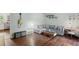 Bright living room with hardwood floors and stylish sectional couch at 3517 Greenway Dr, Marietta, GA 30008