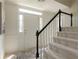Bright entryway with stairs, tile flooring, and a white front door with sidelights at 4085 Chadds Walk, Marietta, GA 30062