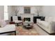 Inviting living room featuring a fireplace, comfortable seating, and elegant decor at 4085 Chadds Walk, Marietta, GA 30062