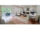 View from hallway to the living room showcasing the fireplace and comfortable seating at 4085 Chadds Walk, Marietta, GA 30062