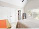 Bright bedroom with a large window, closet and connected bathroom access at 4731 Moon Chase Dr, Buford, GA 30519