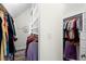 Walk-in closet boasts built in shelves, hanging rods, and hardwood floors at 4731 Moon Chase Dr, Buford, GA 30519