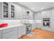 Stylish kitchen features white cabinets, subway tile backsplash, and modern appliances at 4731 Moon Chase Dr, Buford, GA 30519