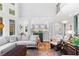 Bright living room features high ceilings, large windows, and an open floor plan at 4731 Moon Chase Dr, Buford, GA 30519