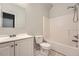 A clean bathroom features a shower and tub combination and a single-sink vanity at 558 Elbridge Nw Dr, Atlanta, GA 30318