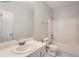 Inviting bathroom equipped with a vanity, toilet and a combined bathtub and shower at 558 Elbridge Nw Dr, Atlanta, GA 30318