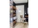 Stylish bathroom featuring shelving, storage baskets, vanity stool, and modern fixtures at 791 Wylie Se St # 911, Atlanta, GA 30316