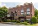 Modern brick townhome featuring private balconies and well-manicured landscaping at 791 Wylie Se St # 911, Atlanta, GA 30316
