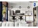 Well-equipped kitchen with stainless steel appliances and bar seating area at 791 Wylie Se St # 911, Atlanta, GA 30316
