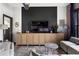 Stylish living room with contemporary decor, large TV, and comfortable seating at 791 Wylie Se St # 911, Atlanta, GA 30316