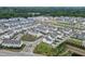 New townhome community boasts meticulously manicured landscaping and tree-lined streets at 1117 Larkin Dr, Buford, GA 30518