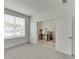 Bedroom with double doors leading to stairway and neutral decor at 1117 Larkin Dr, Buford, GA 30518