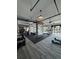 Well-equipped gym featuring mirrored walls and various cardio machines for a complete workout at 1117 Larkin Dr, Buford, GA 30518