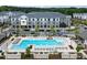 Resort-style community pool with lounge chairs, and a well-equipped fitness center for resident enjoyment at 1117 Larkin Dr, Buford, GA 30518