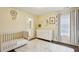 Bedroom with wood flooring, white dresser, and decor at 2023 Yellow Finch Trl, Atlanta, GA 30316