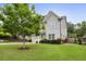 Charming home with a well-maintained lawn, a detached garage, and lush landscaping at 2023 Yellow Finch Trl, Atlanta, GA 30316