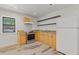 Kitchen with light wood cabinets and appliances at 2377 Pine Mountain Rd, Kennesaw, GA 30152